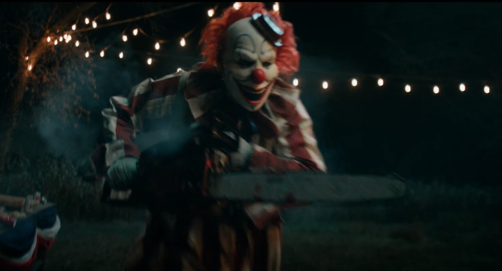 Clown in a Cornfield Movie Review: Blood, Gore, and Fun 6 Clown in a Cornfield Movie Review: Blood, Gore, and Fun Clown in a Cornfield
Horror Movie Review
Eli Craig
Movie Review
Adam Cesare